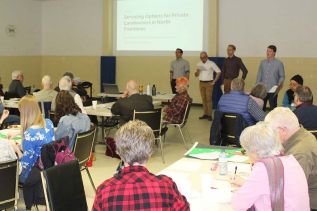 Queen’s University grad students put on a series of seminars and exercises at a planning workshop last Friday in Sharbot Lake. Photo/Craig Bakay